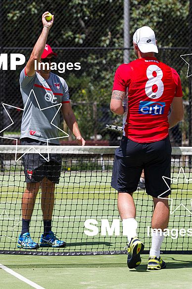 Nick Davis of the Sydney Swans and Sam Groth of Australia training with the Sydney Swans