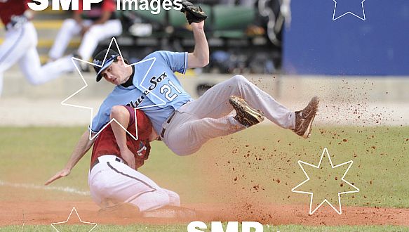 Melbourne Aces Andrew Russell and Sydney Blue Sox Mark Holland, in action during game 1 Round 5 , Melbourne Aces verses Sydney Bluesox.