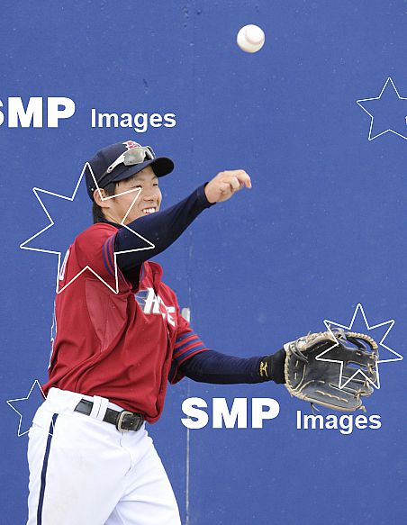 Melbourne Aces Itaru Hashimoto is all smiles after taking an outfield catch during Game 4 of Round 5 Australian Baseball League.