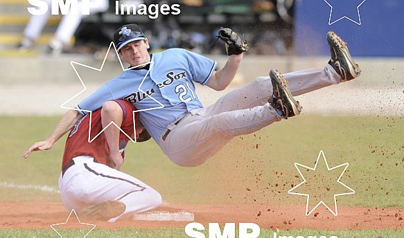 Melbourne Aces Andrew Russell and Sydney Blue Sox Mark Holland, in action during game 1 Round 5 , Melbourne Aces verses Sydney Bluesox.